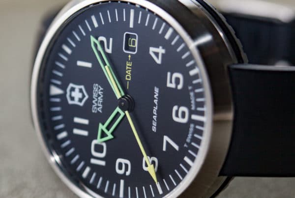 The earliest Swiss Army SeaPlane watches had a flat dial printed with Tritium markers and neon hands
