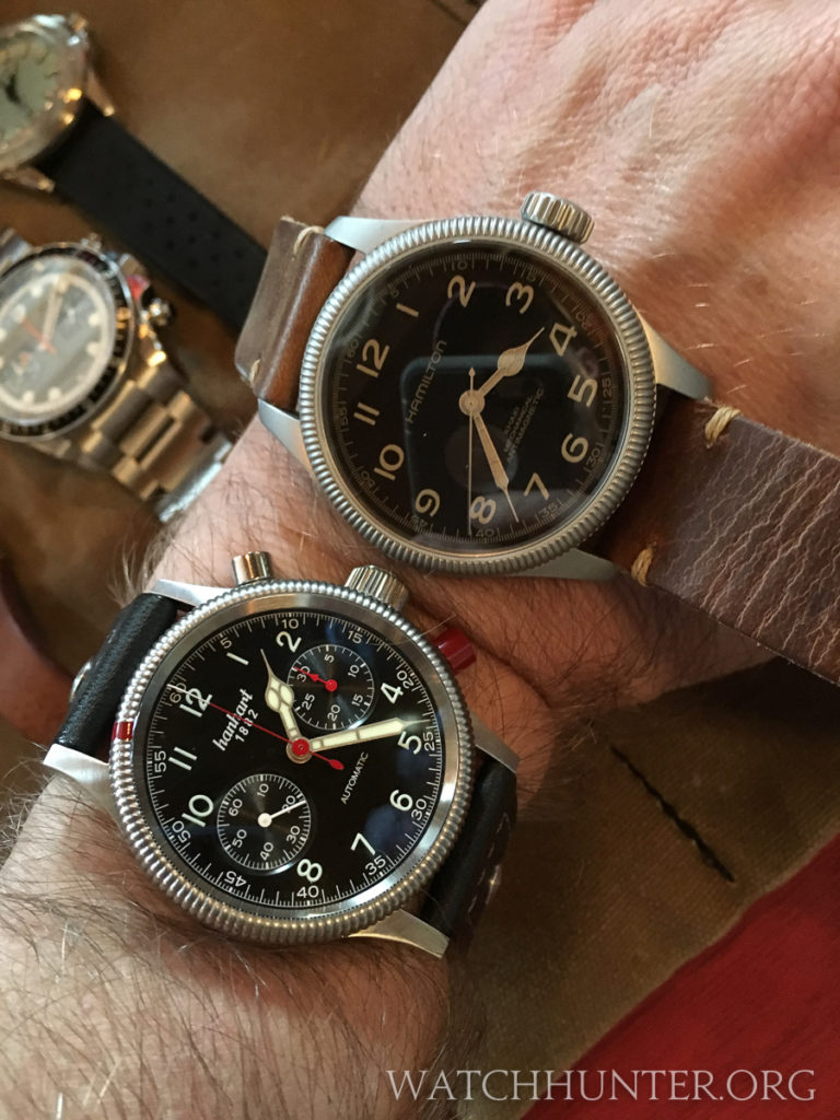 Two similar watches with cathedral hands and coins edge bezels