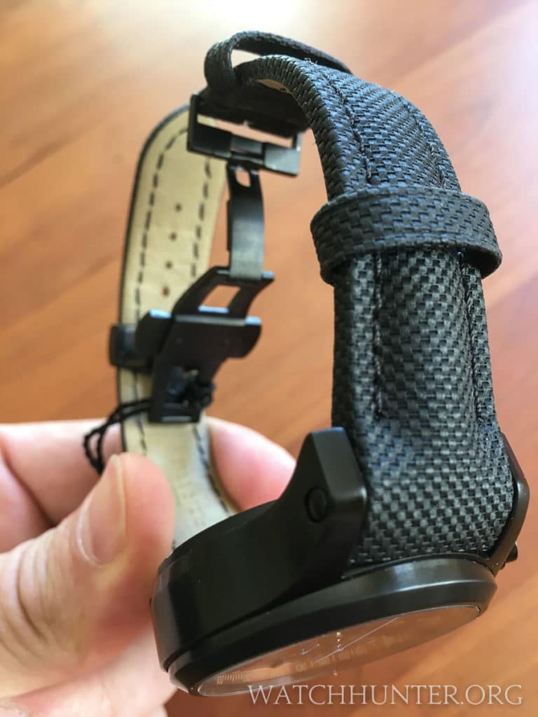 Pre-curved watch bands and a deployant clasp improve the watch's fit