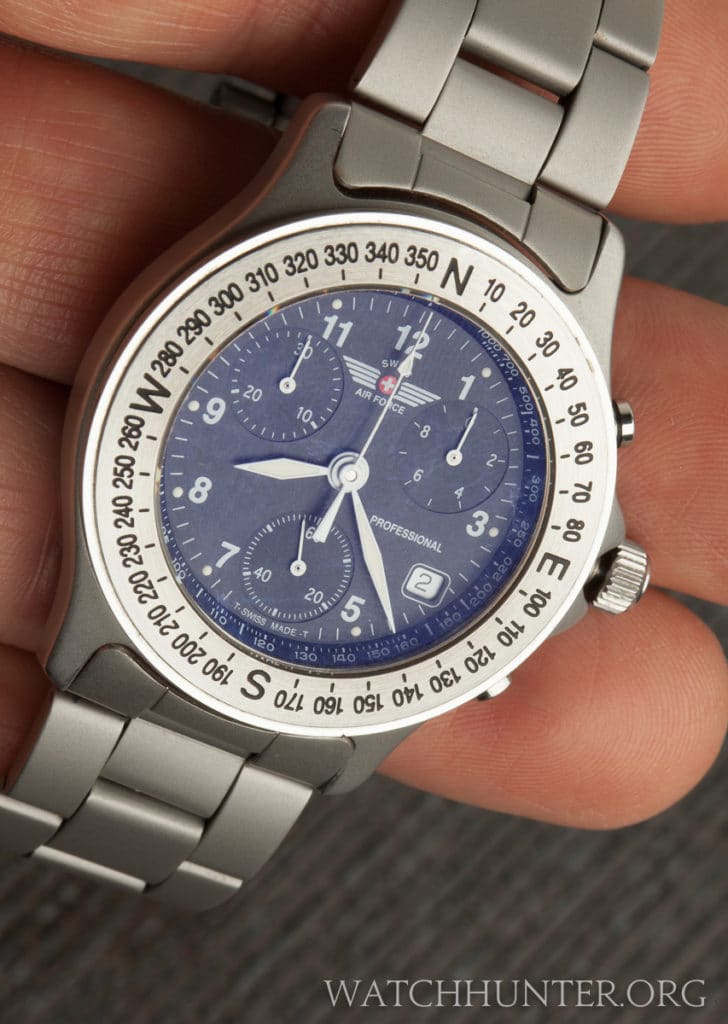 The stationary compass bezel might be more for show than use. Notice the blue anti-reflective crystal coating.