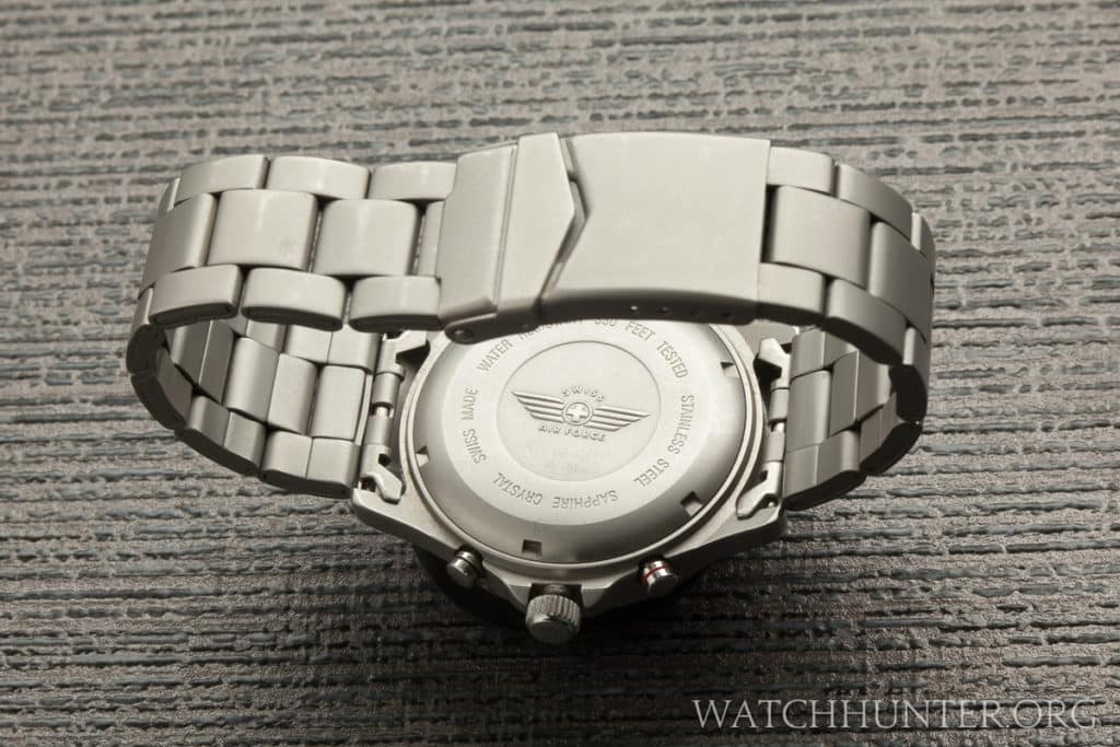 A battery-powered quartz movement hides behind the case back